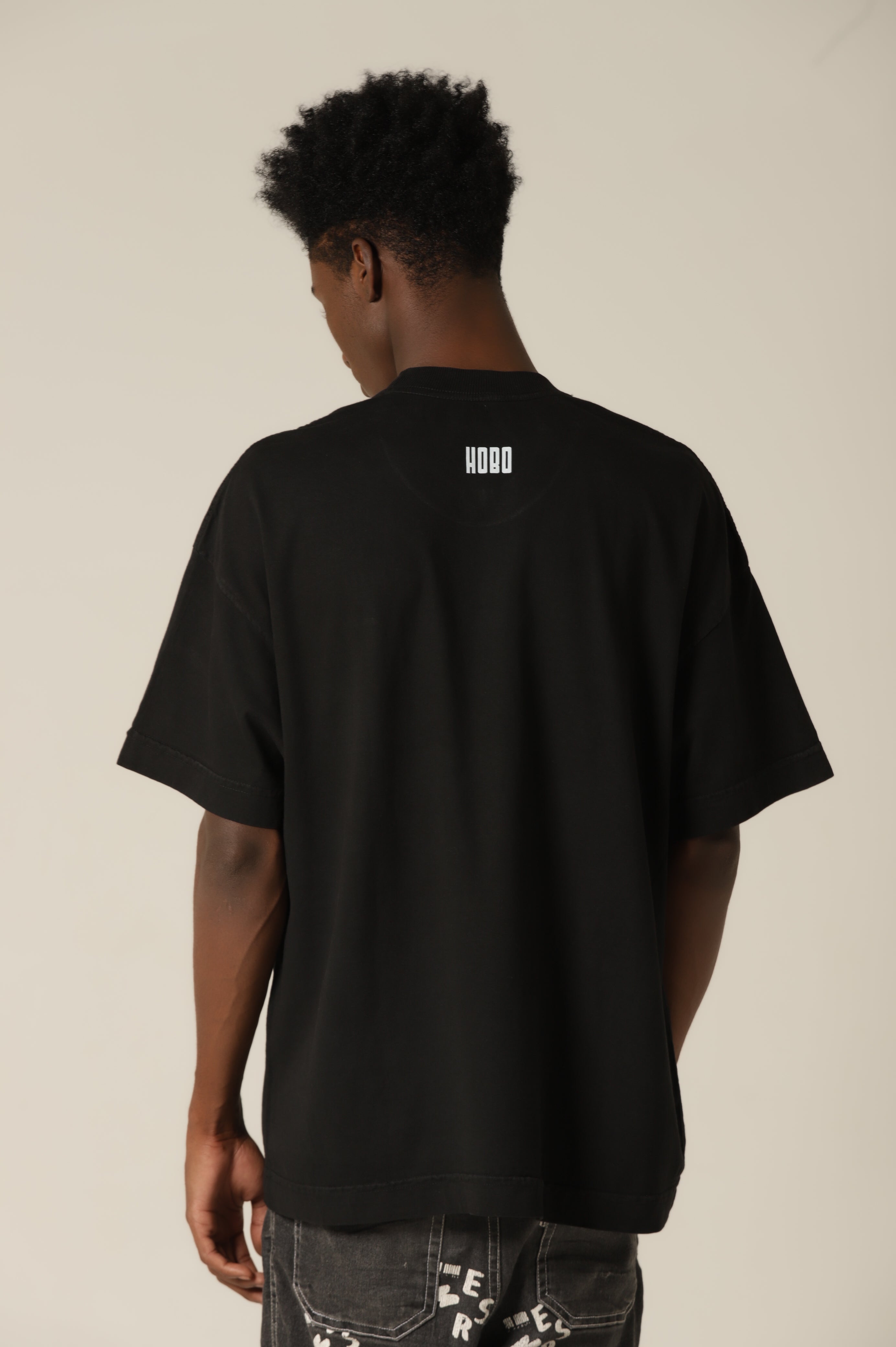 Camiseta Oversized Spoiler - Preto [ Estampa Branca ]